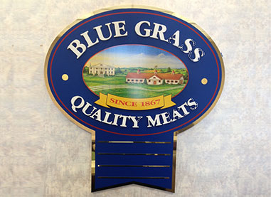 A new corporate identity was created. The blue ribbon of quality. Blue Grass Quality Meats.